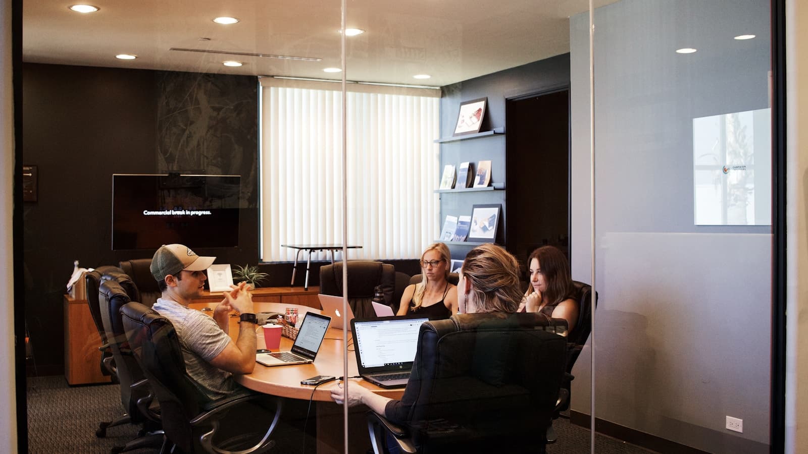 Cross-functional team working together around a table
